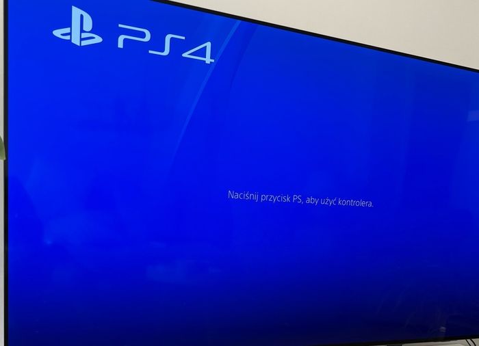 PlayStation 4 Console + 2 Blue Controllers