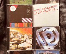 Mix of rock CDs- Pink Floyd, Rush, Led Zeppelin, Deep Purple