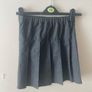 Dunnes grey skirt (as new) age 7-8 Image 5