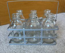 A Set of 6 Small Vintage Milk Bottles