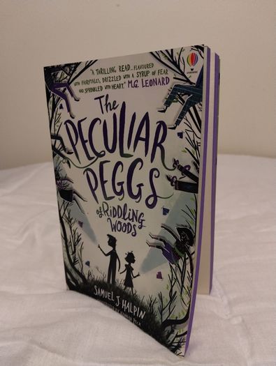 The peculiar peggs of Riddling Woods by Samuel J. Halpin