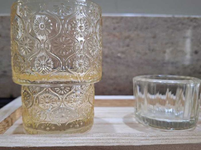 Decorative glasstealight holders on  wooden base