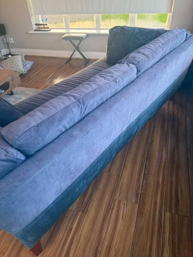 Blue fabric three-seater sofa