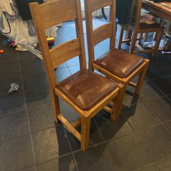 Reduced to sell  4 solid kitchen chairs with brown leather seats