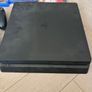 Sony PlayStation 4 console with two controllers and three games Image 2