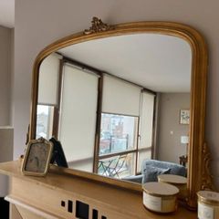 Gold mirror over mantle