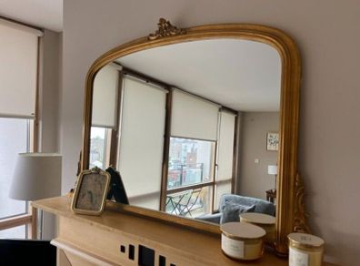 Gold mirror over mantle