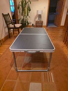 Portable folding table in very good used condition.