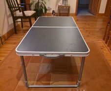 Portable folding table in very good used condition.
