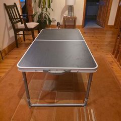 Portable folding table in very good used condition.