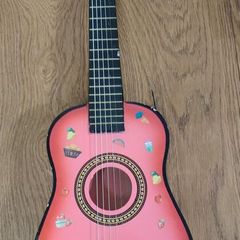Toy guitar, missing 1 string