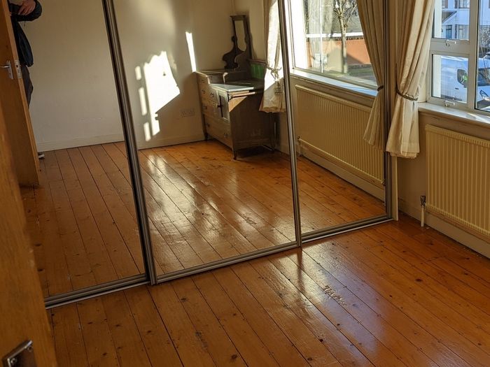 Sliding mirrored wardrobe doors