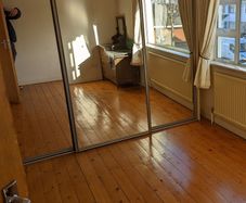 Sliding mirrored wardrobe doors