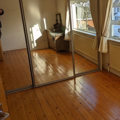 Sliding mirrored wardrobe doors