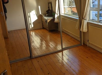 Sliding mirrored wardrobe doors