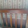 Wooden bed headboard and floral armchair Image 2