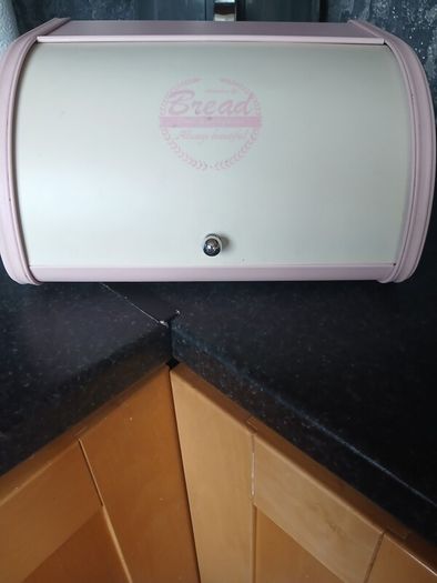 Bread bin and 3 Glass Canisters.