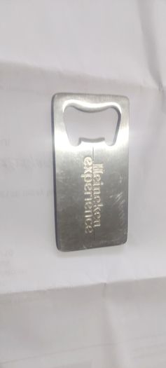 heineken bottle opener, see pictures for condition, buyer collects or pays postage thank you,sold as is