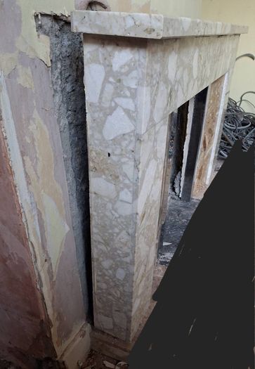 Tiled fireplace with chrome inner surround