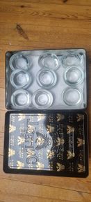 Glass Tea Light holders in a Teelings tin.