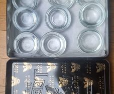 Glass Tea Light holders in a Teelings tin.