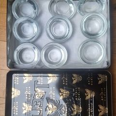 Glass Tea Light holders in a Teelings tin.
