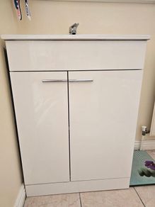 bathroom cabinet and sink
