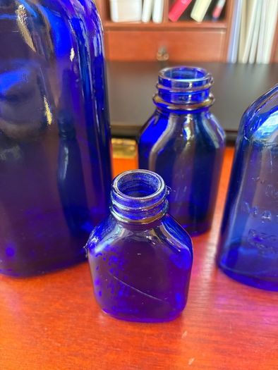 Antique bottles milk of magnesia