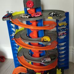 Hot wheels tower and multiple cars