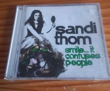 SANDI THOM Smile... It Confuses People