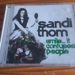 SANDI THOM Smile... It Confuses People