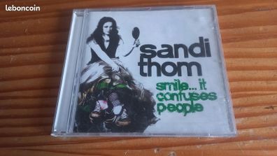 SANDI THOM Smile... It Confuses People