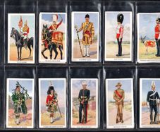 1939 Godfrey Phillips Cigarette Cards Soldiers of the King Complete set of 36 on album leaves. Note shown in 4 images.