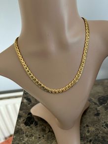 Gold tone necklace