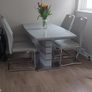 gray extending dining table and 4 chairs Image 3