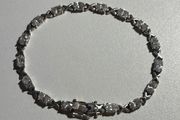 Sterling Silver Tennis XOXO Bracelet with Cubic Zirconia Stones