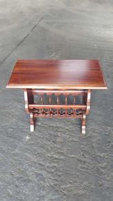 side table with  newspaper rack