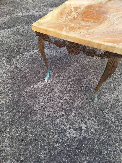 Vintage metal coffee table in need of restoration