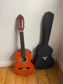 3/4 acoustic guitar