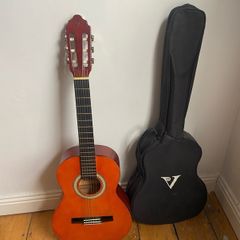 3/4 acoustic guitar