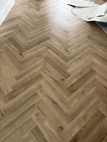 Herringbone laminate floor