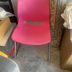 Pink plastic chair