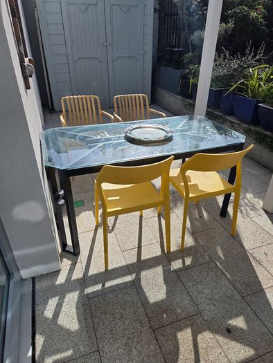 Alfrank metal and glazed dining table, black steel with safety glass tabletop