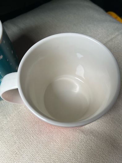 A Pair of Belleek Hope and Joy Mugs