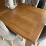 Solid oak dining table and chairs Image 7