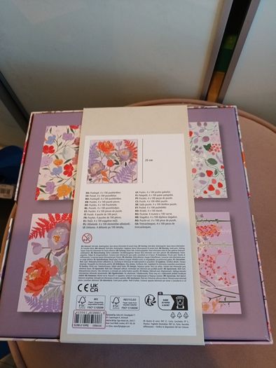 4 jigsaw puzzles on decorative box