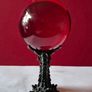 Red crystal/glass ball and metal dragon stand. Image 3