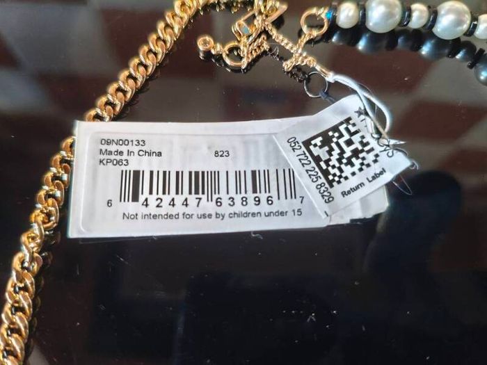 Karl Lagerfeld asymmetrical necklace and bracelet set