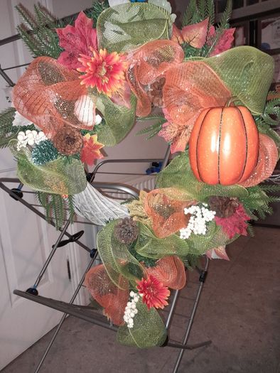 Door Wreath ( Giant- sized) and floral arrangement.