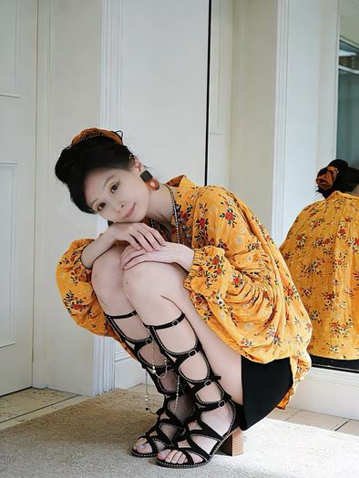 Artistic oversized floral blouse in a warm golden yellow tone